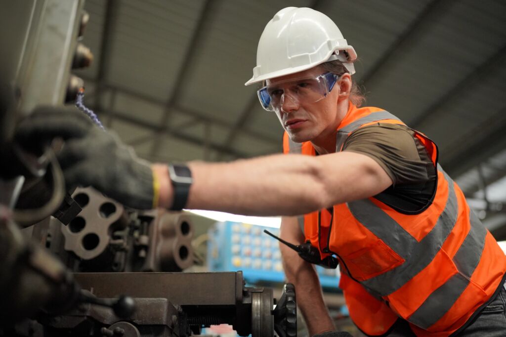 industrial factory employee working in metal manufacturing industry